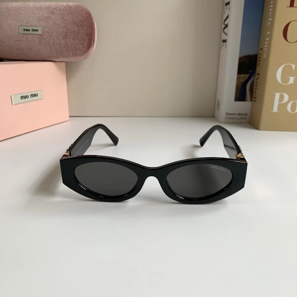 Miu Miu black sun protection sunglasses and aviator sunglasses